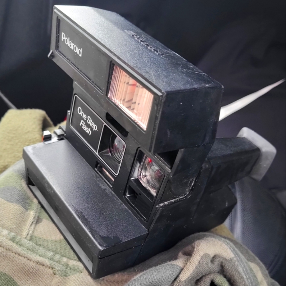 Polaroid One Step Flash Camera